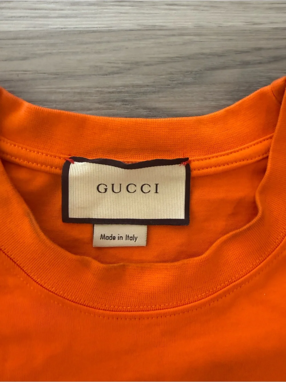 Gucci Orange Tee with Blue 'GUCCI TIGER' and Tiger Graphic